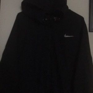Women’s Black Nike reflective rain jacket